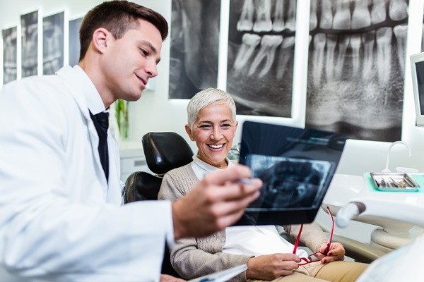 Dentures Vs  Dental Implants: Which Is The Right Choice For You?